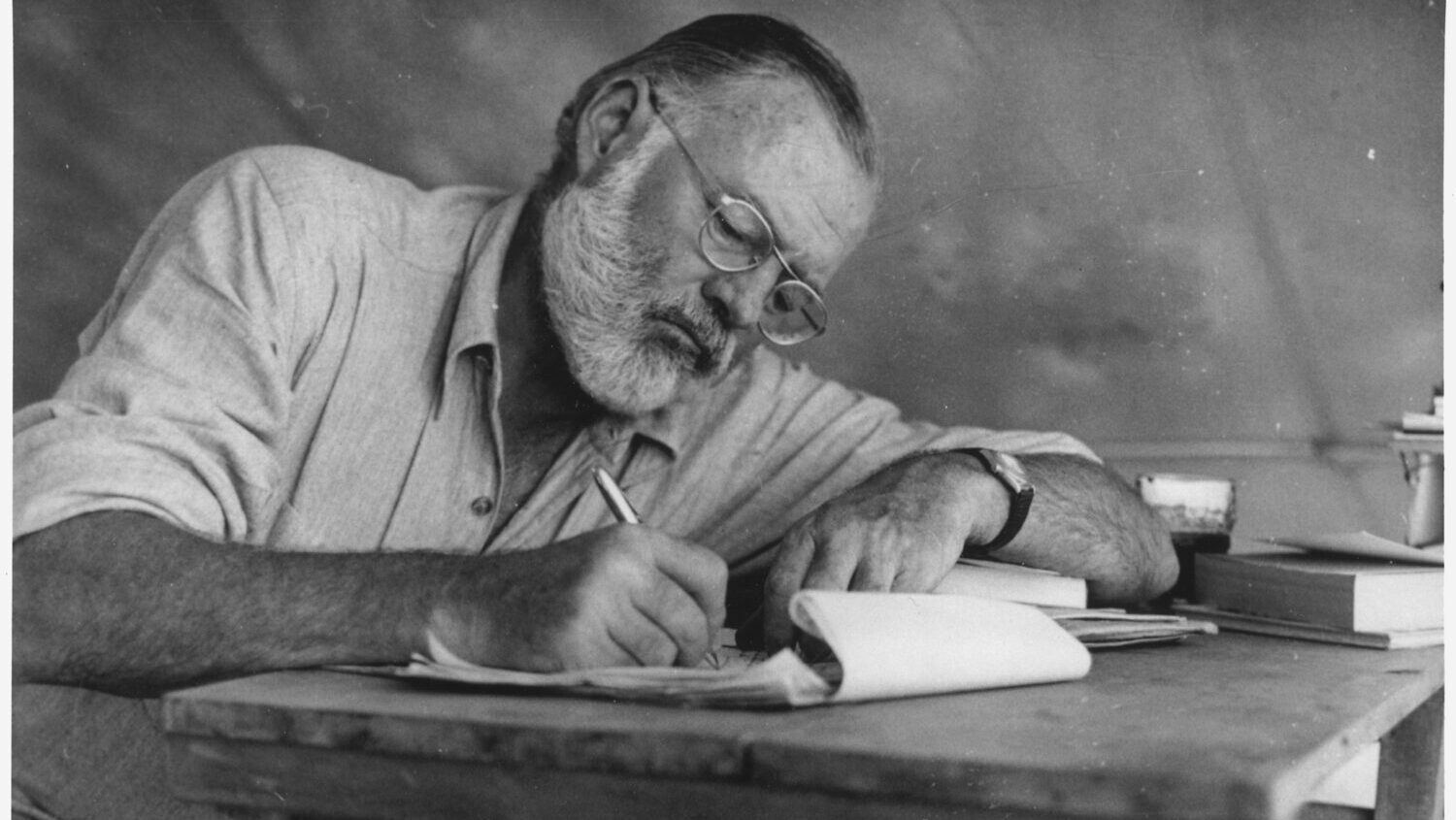 Ernest Hemingway Writing at Campsite in Kenya NARA